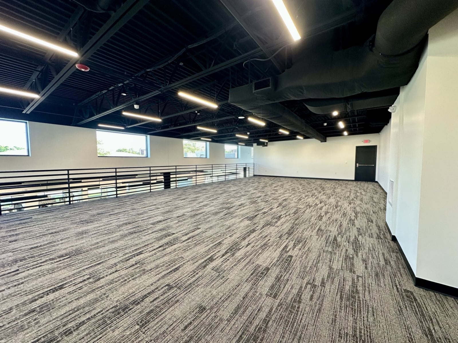 A mezzanine suite overlooking the coworking floor at SpringPad in Lincoln, Nebraska