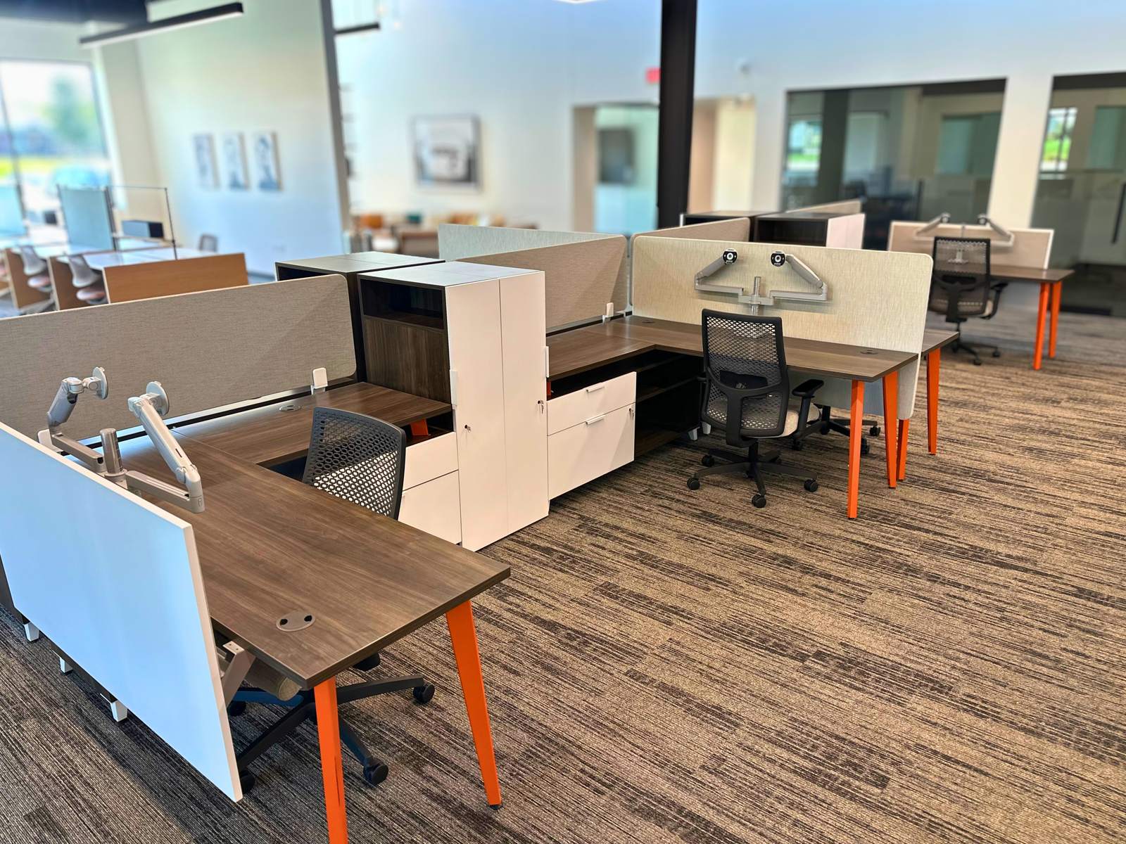 Dedicated desk pods with dividers and storage at SpringPad in Lincoln, Nebraska